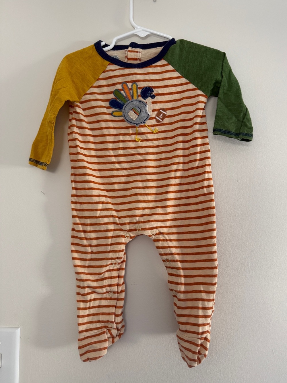 Mud Pie Striped Footie in Orange, Cream, Yellow & Green
